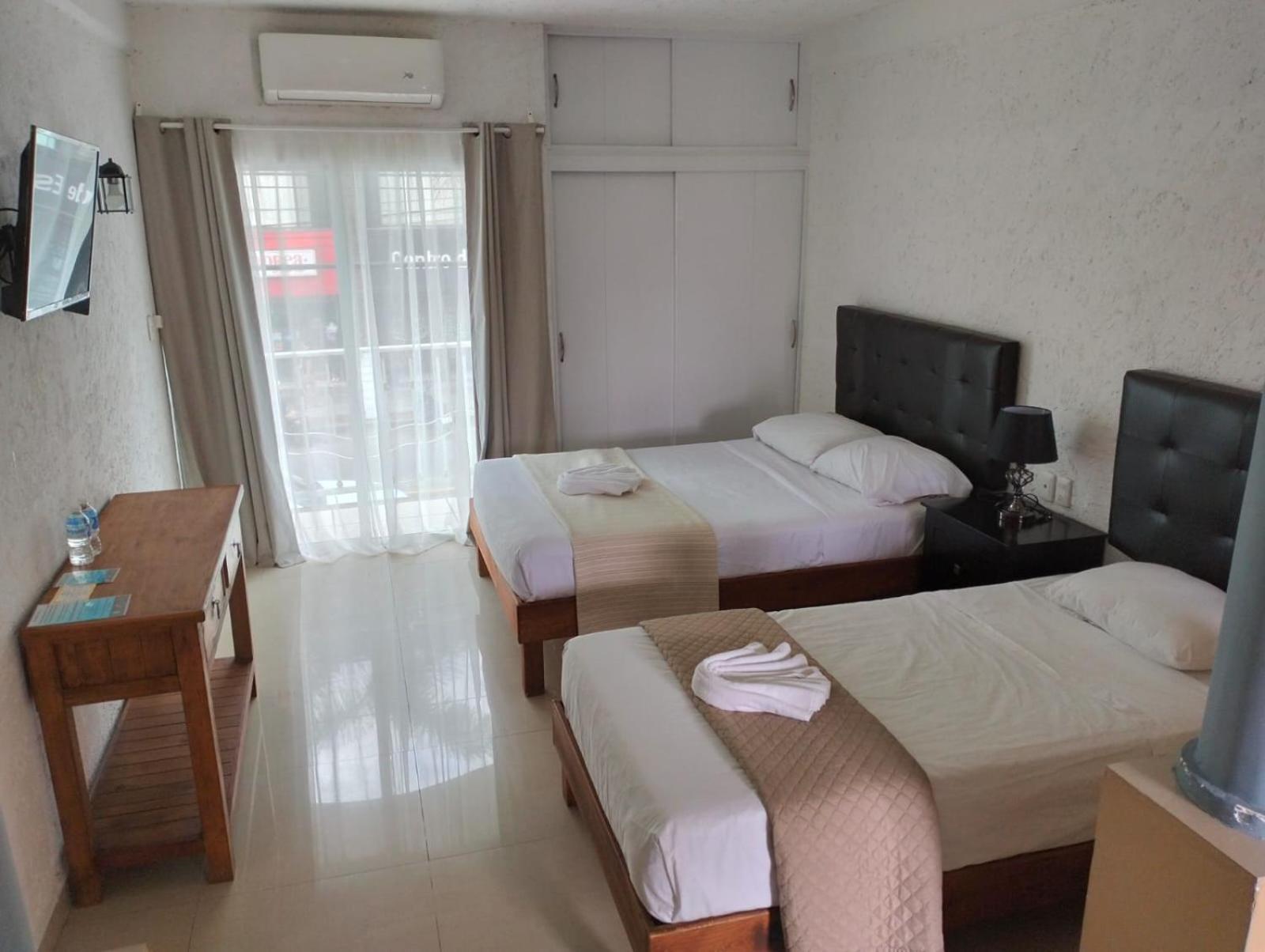 Hotel Dos Mundos, Isla Косумел Екстериор снимка